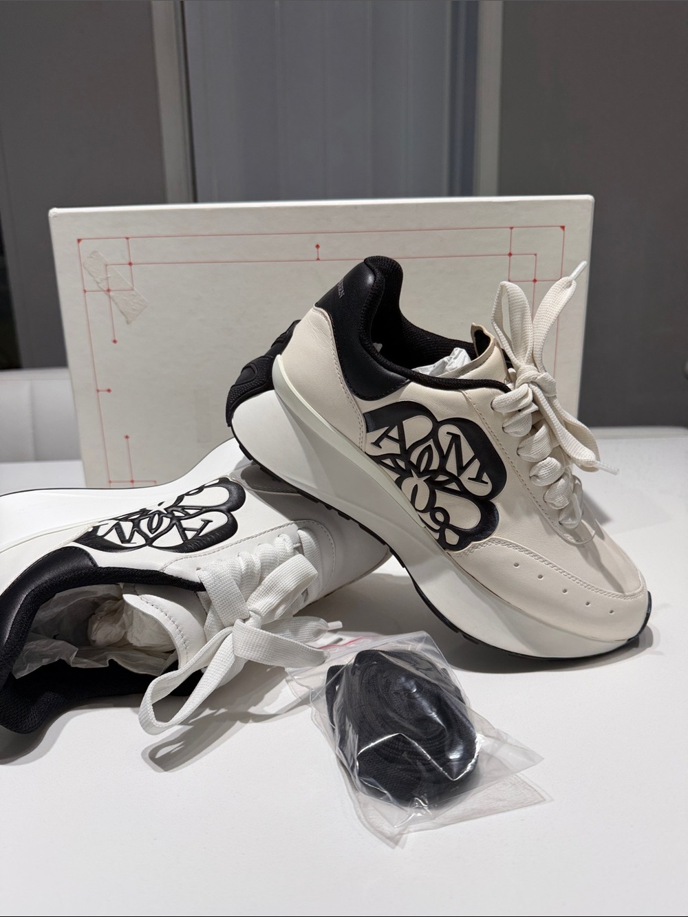 Alexander McQueen White and Black Logo-Accent Sneakers